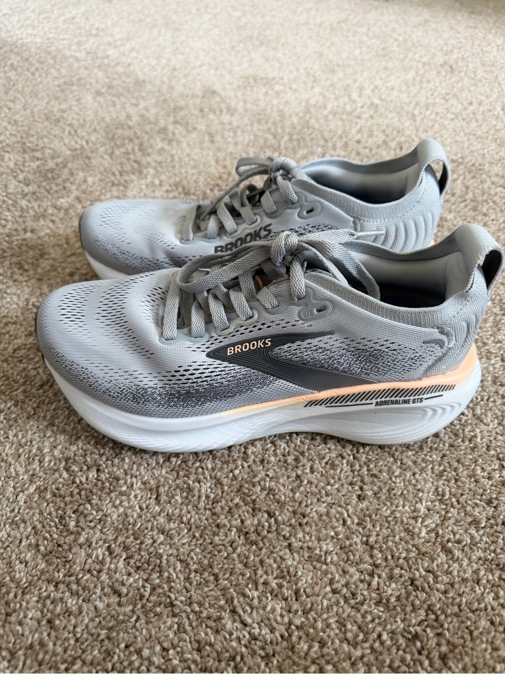 Brooks Women’s Adrenaline GTS Sneakers in Light Gray with Peach Accent